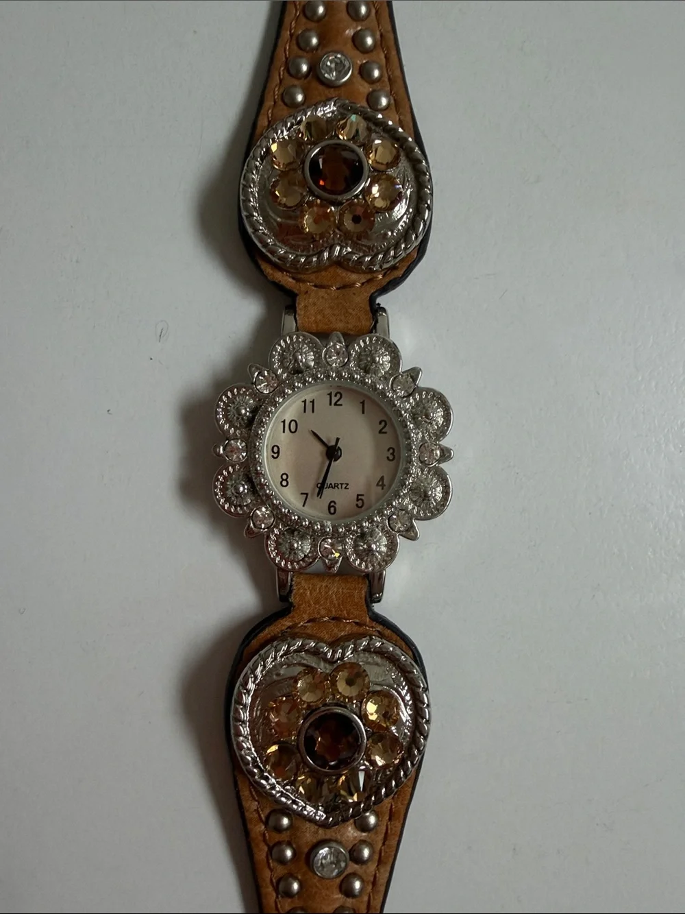 Source Unknown Brown Leather Wristwatch  Silver-Tone Floral Bezel needs battery